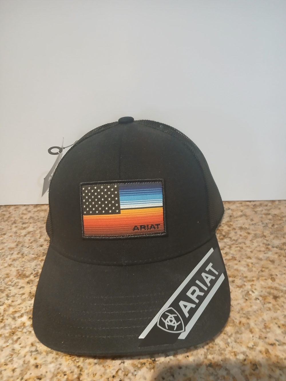 Ariat Black Trucker Hat with Sunset American Flag Patch